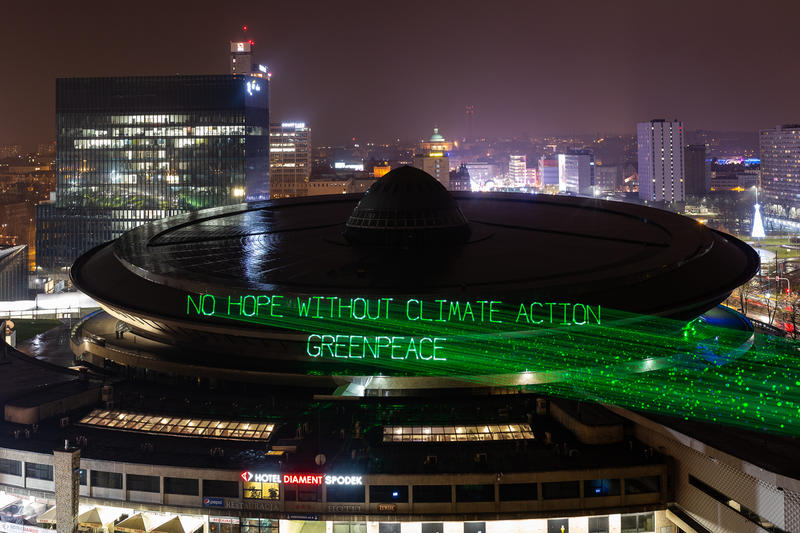 Laser projection on the COP24 venue in Poland urging the world leader to act on climate. © Konrad Konstantynowicz