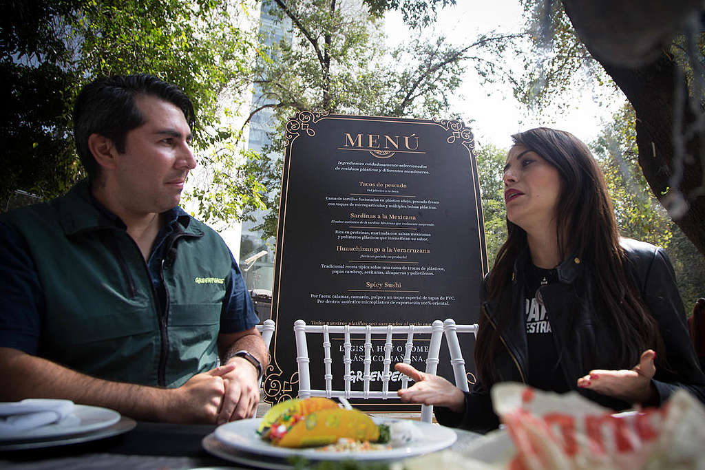 Verónica Delgadillo, Senator of the Citizens’ Movement political party (R) meets Miguel Rivas, Greenpeace Oceans campaigner (L).  Greenpeace organises a banquet outside the Senate of the Republic in Mexico City, to raise awareness on plastic and microplastic pollution. Various creative and colourful dishes made out of plastic waste items are displayed on a buffet table. The activists demand that the Mexican legislators act to stop the plastic contamination.Plastic Banquet at the Senate of the Republic in Mexico. ©Ilse Huesca Vargas / Greenpeace