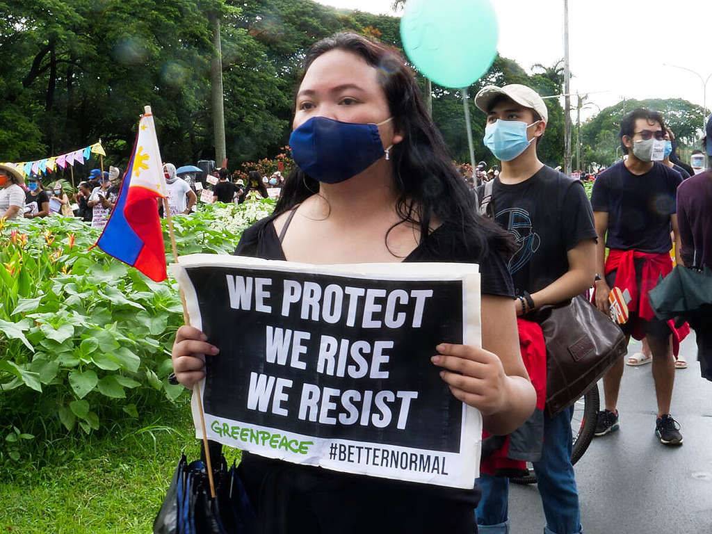 Greenpeace activists join the communities and civil society at the University of the Philippines, Quezon City in commemorating Independence Day in a peaceful solidarity activity to call on the government to scrap the proposed anti-terrorism bill.  © Greenpeace / Grace Duran-Cabus