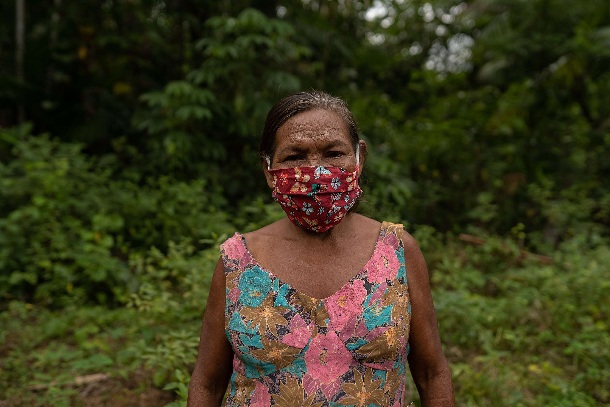 Women from the Dâw People wear masks to protect from COVID-19. © Christian Braga / Greenpeace