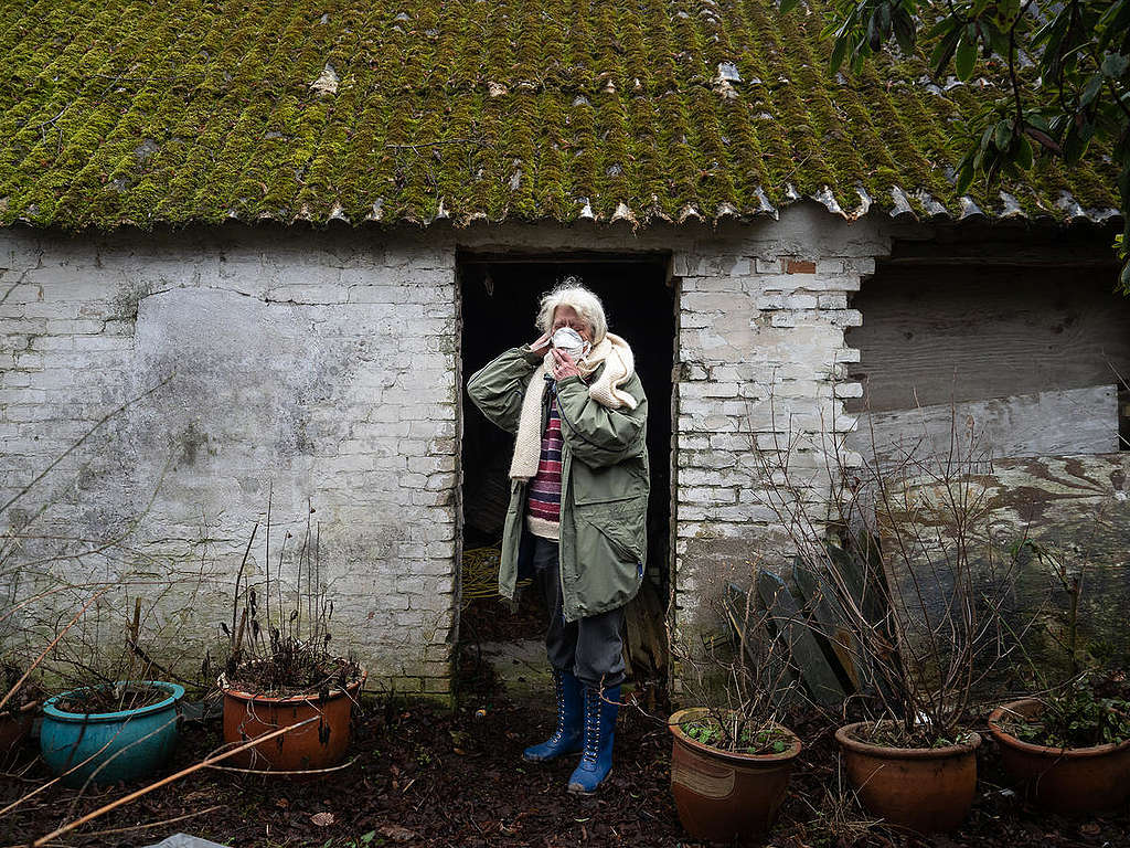 Woman Living near Vandvaerksgaarden Factory Farm, Denmark. © Greenpeace / Wildlight / Selene Magnolia