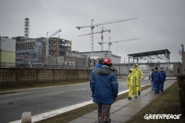 Thirty years after the Chernobyl nuclear disaster, Greenpeace re-visits reactor 4 and the new so-called "New Safe Confinement".  © Denis Sinyakov / Greenpeace