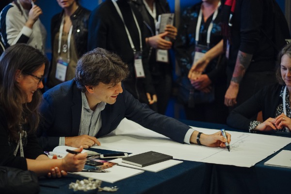 Person drawing on a table