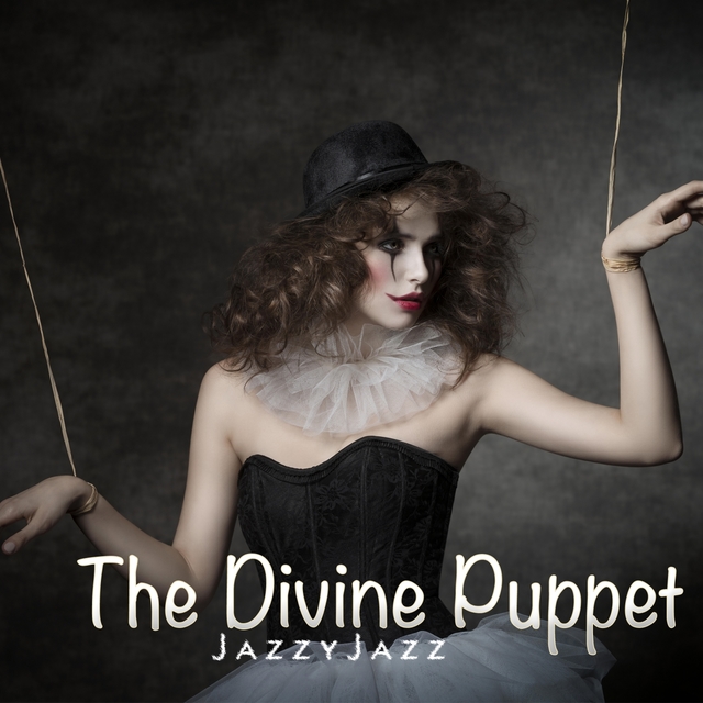 Couverture de The Divine Puppet