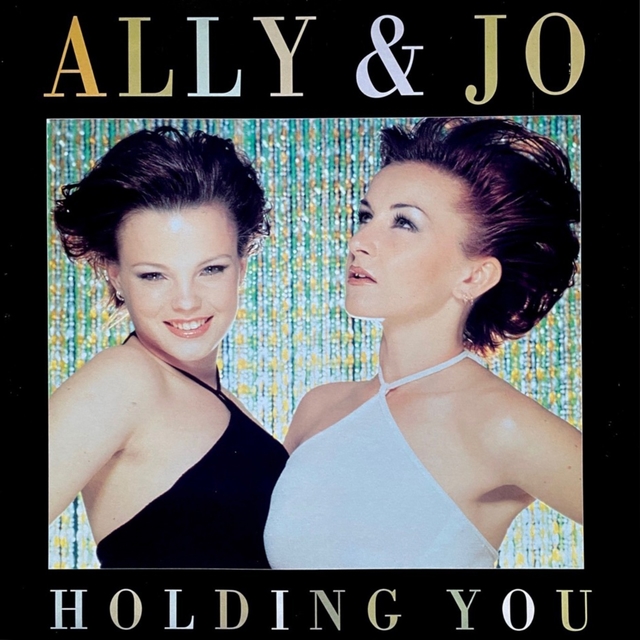 Couverture de Holding You