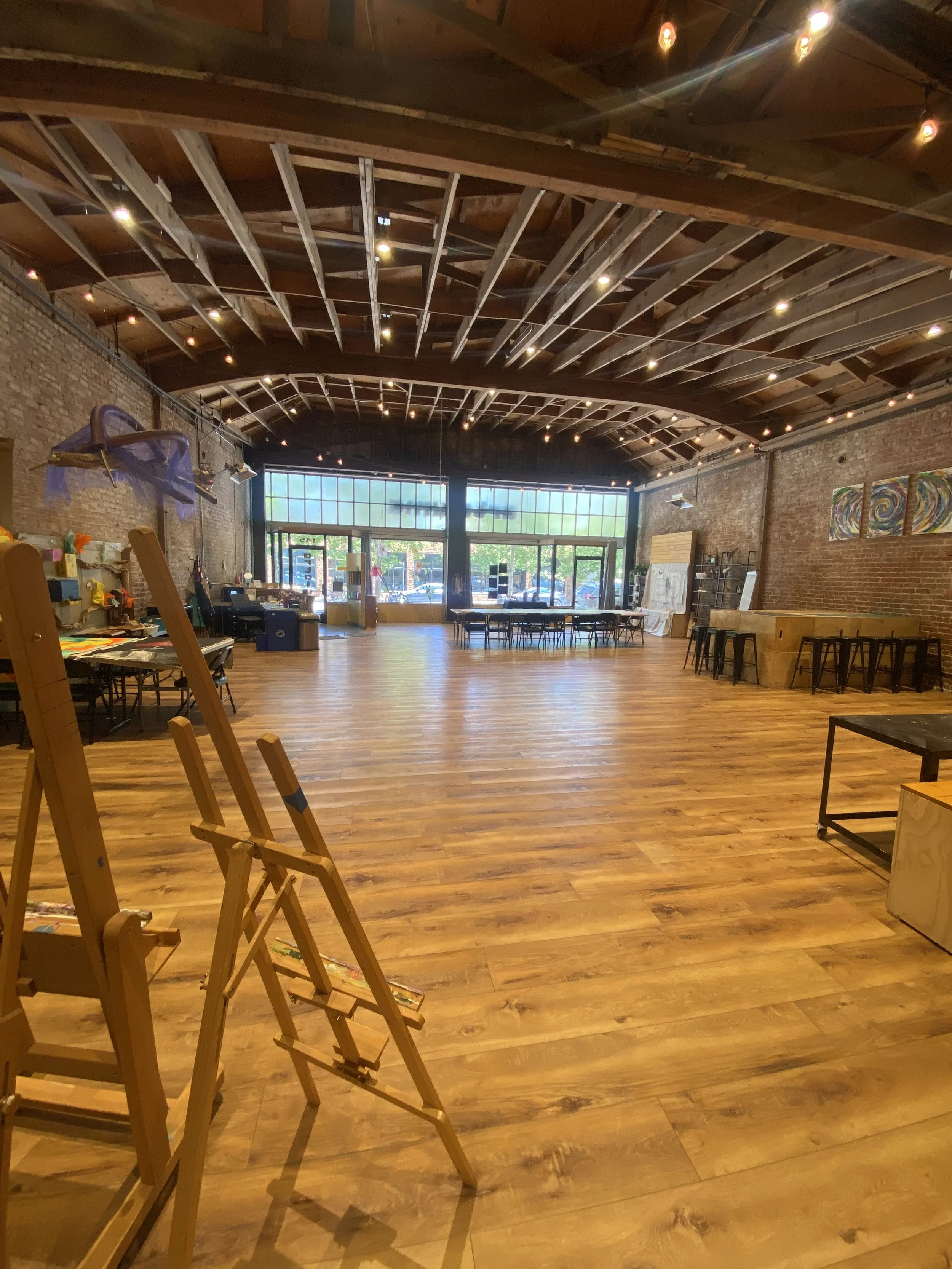 The Artaluma studio set up with easels for an open class