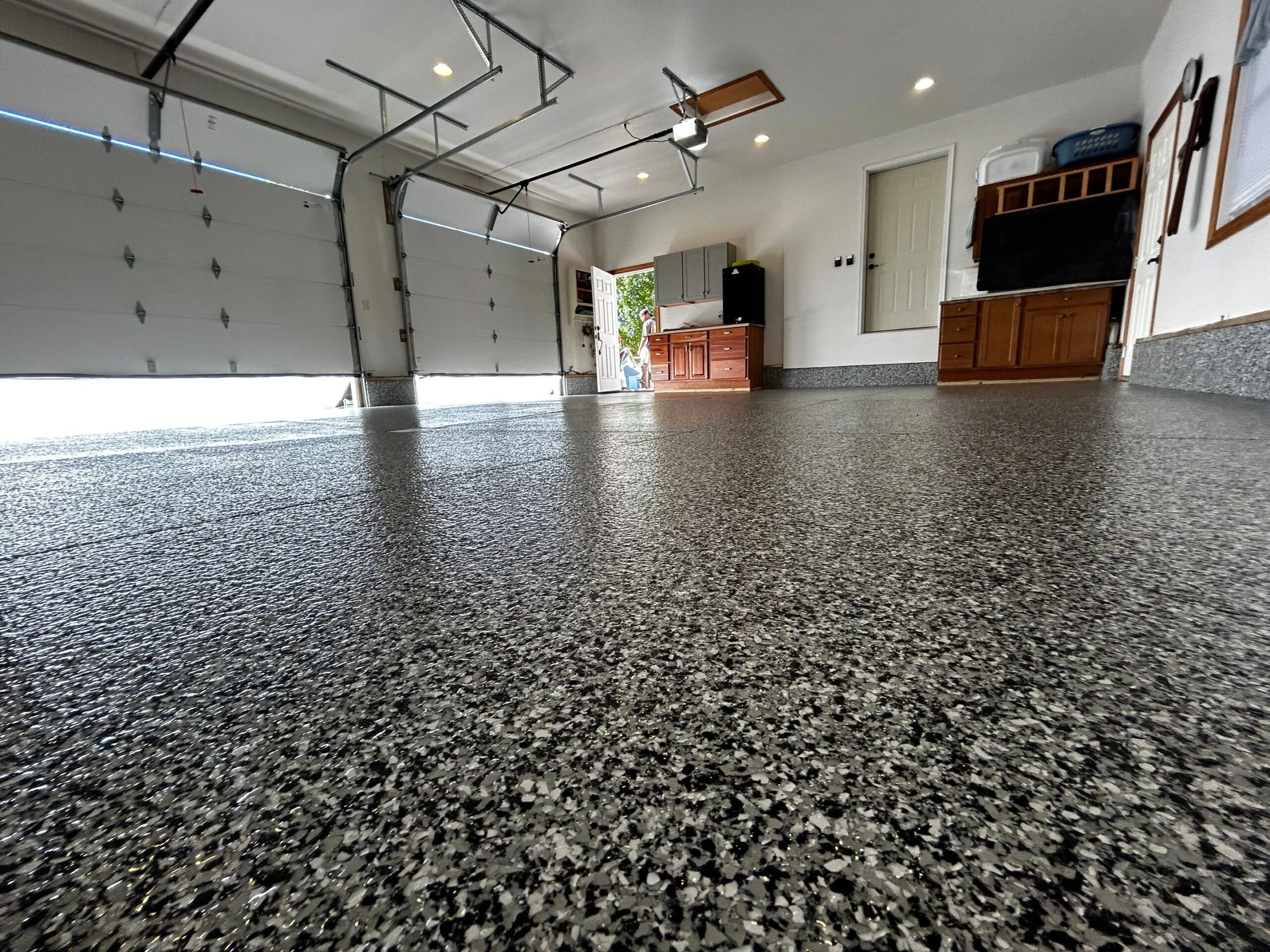 Why Your Epoxy Garage Floor is Peeling: Causes, Fixes, and When to Recoat