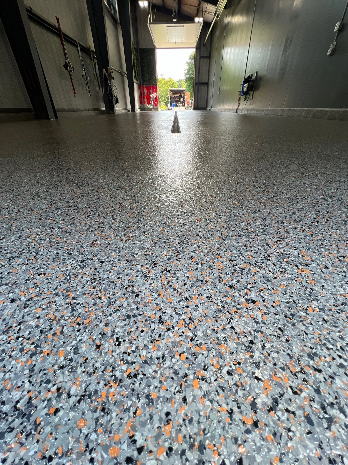 Epoxy vs. Polyurea vs. Concrete Stain: Which Basement Floor Coating is Best for Grand Rapids Homes?