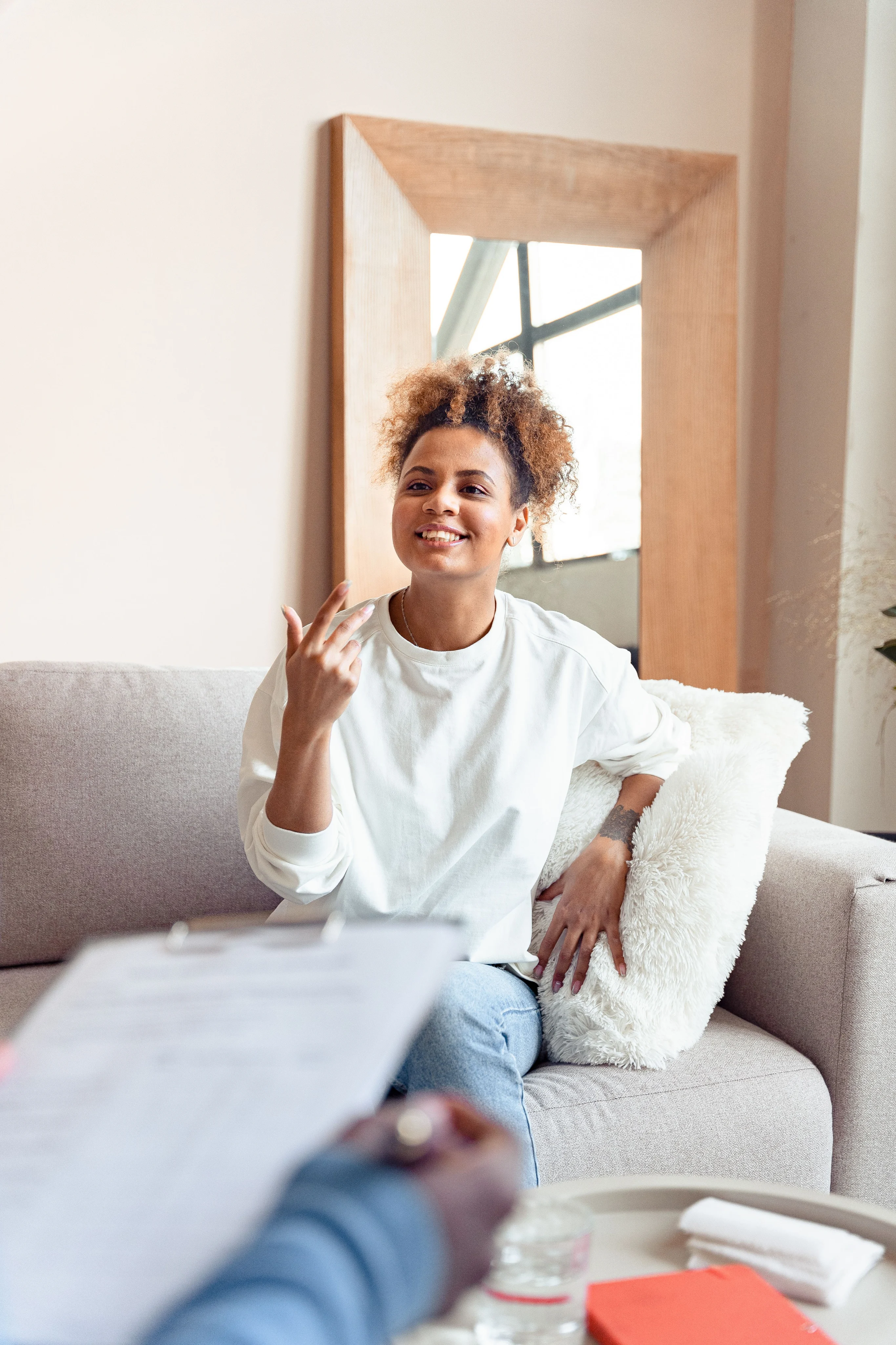 Woman speaking with a therapist during a session