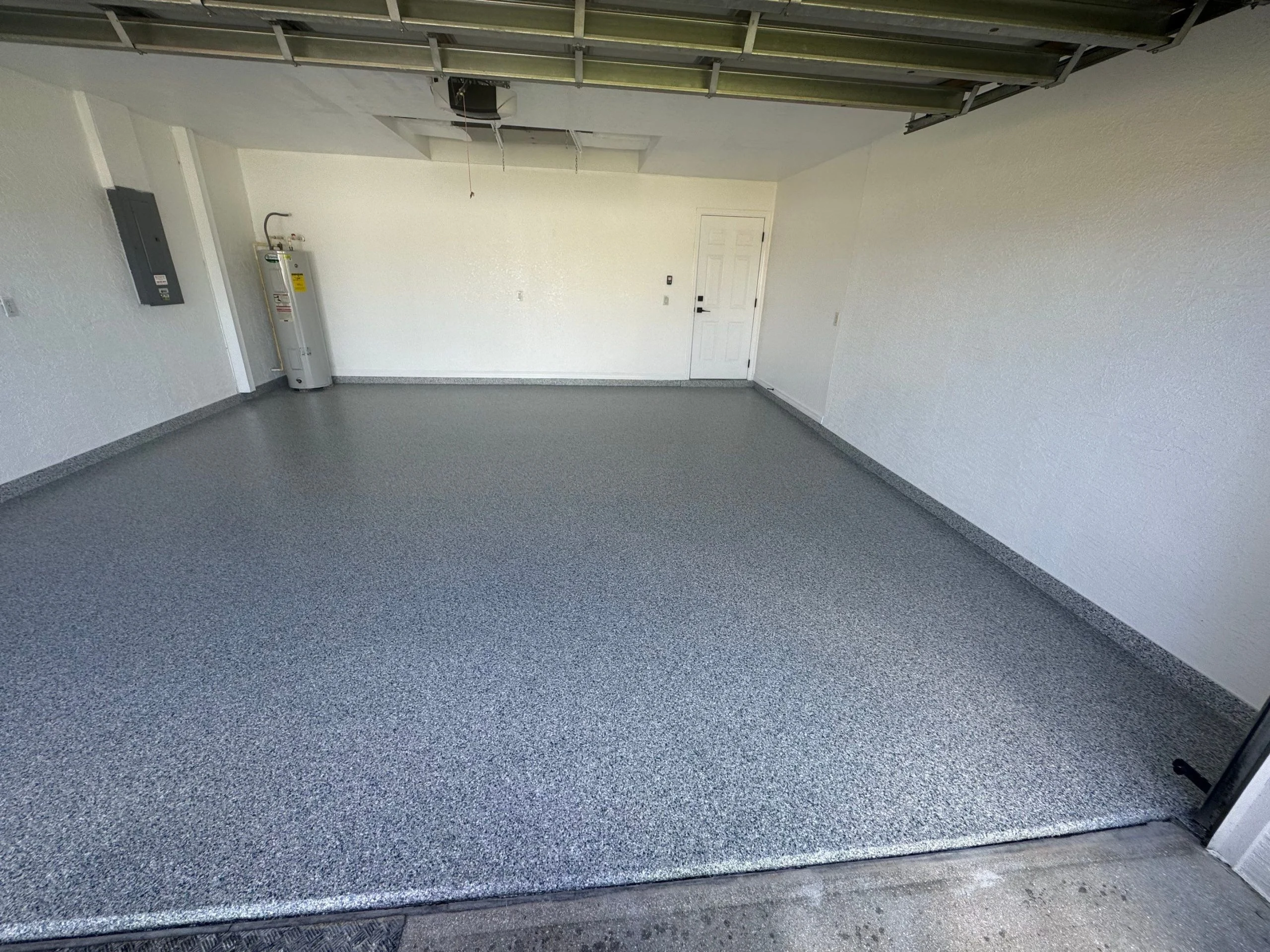 Worn Garage Floor Transformed into a Durable and Polished Space in Cape Coral, FL