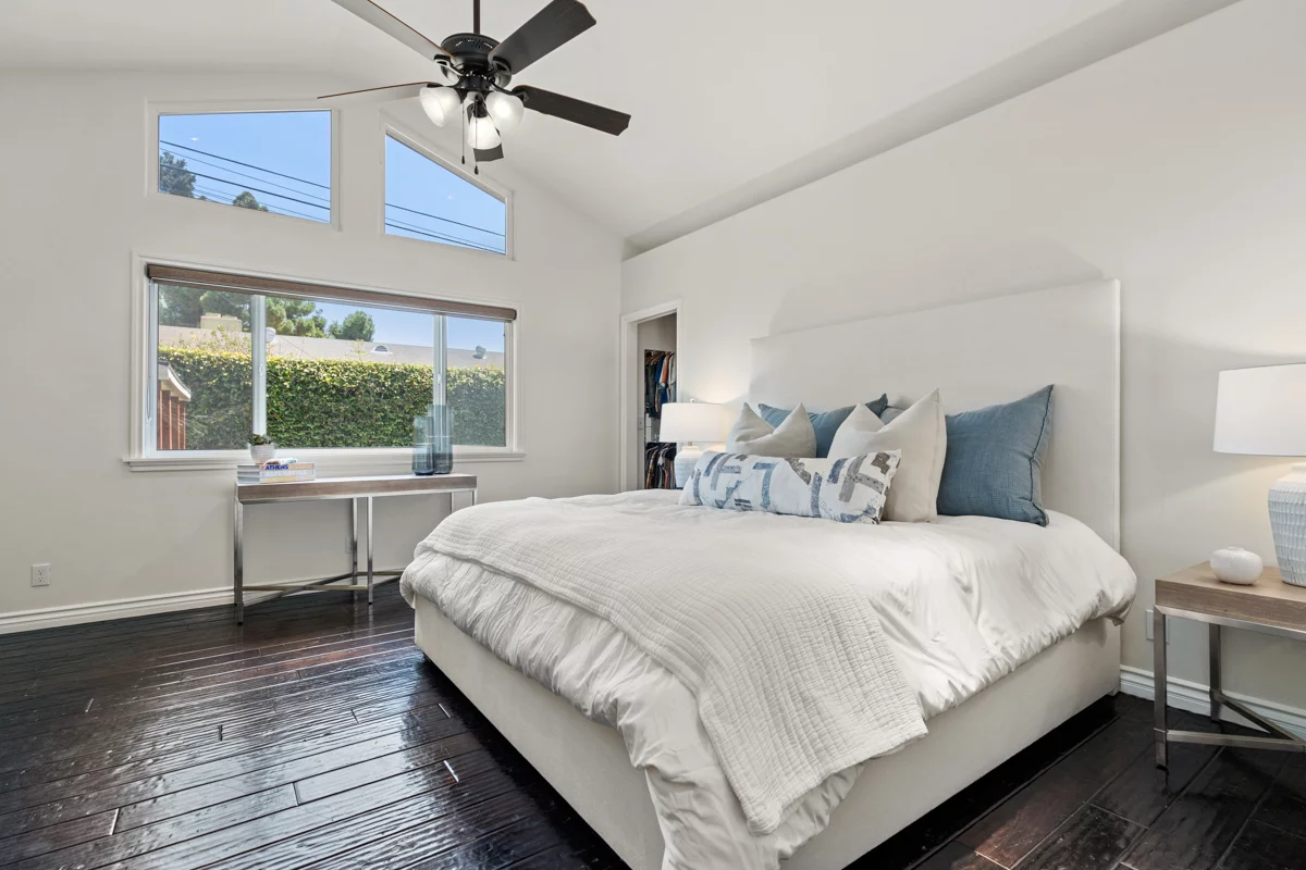 A bright, comfortable bedroom inside the Renaissance Recovery California residence