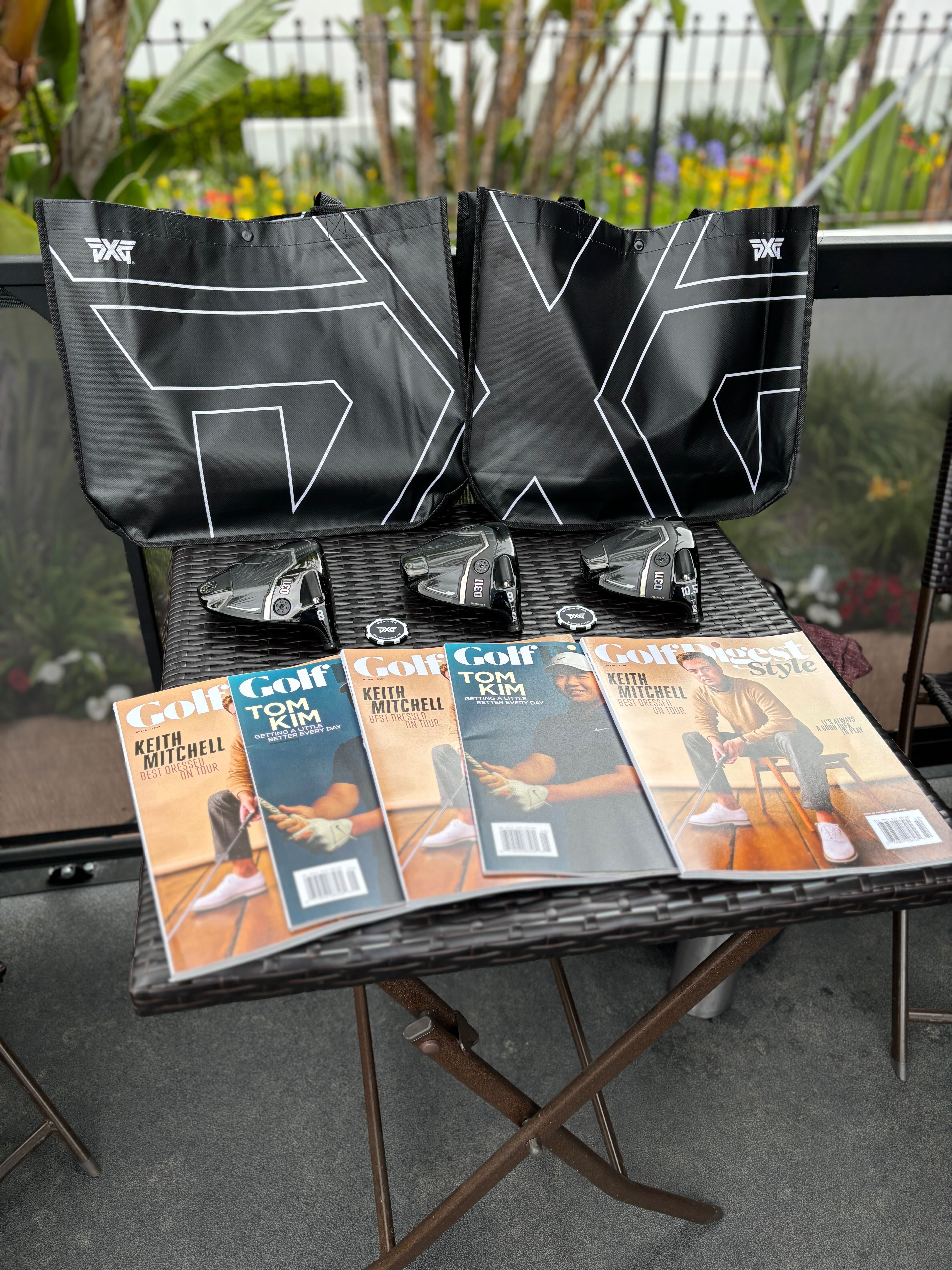 PXG branded gift bags, three new model driver heads, and Golf Digest Style magazines staged as a product placement and giveaway display