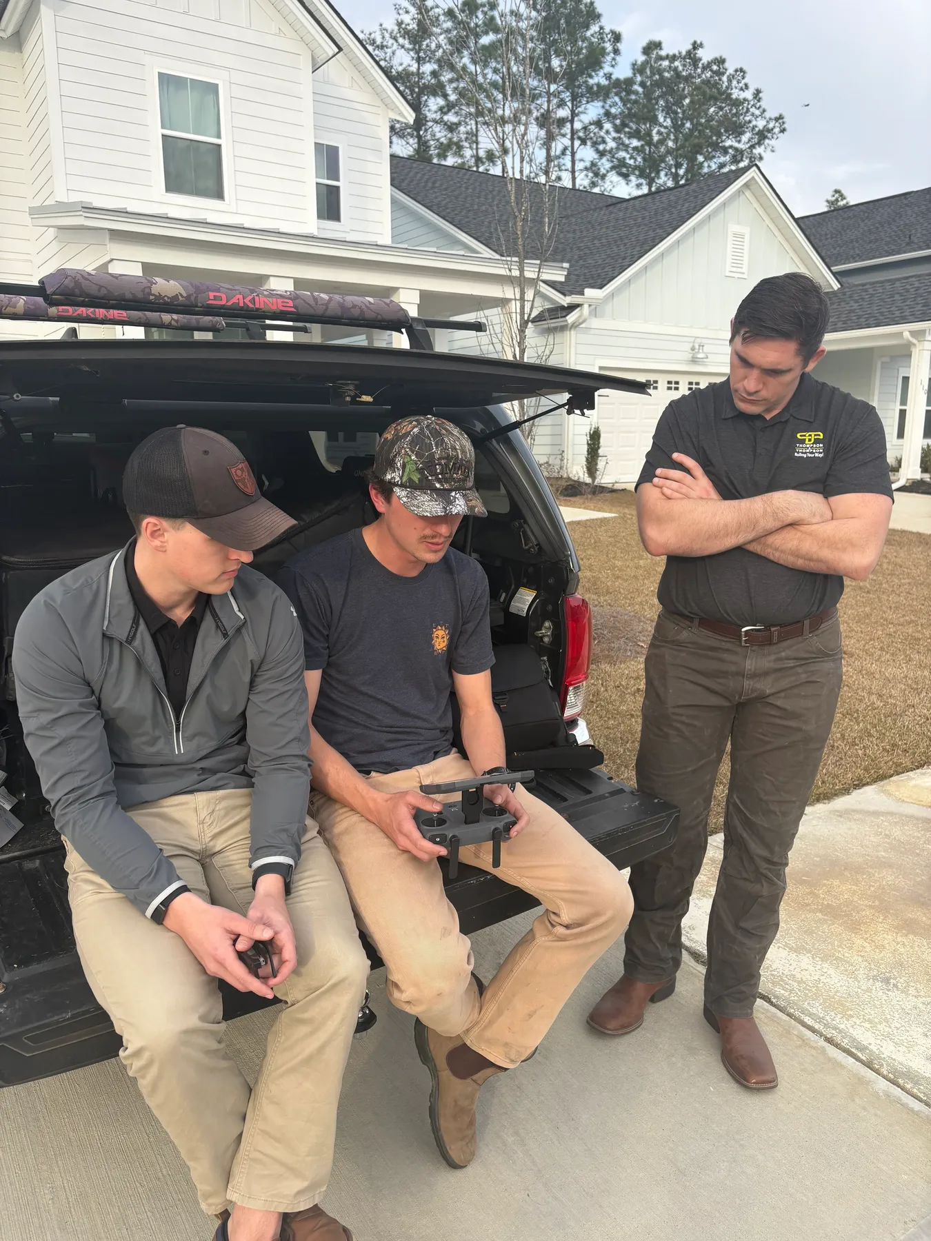 Chantz Yager with a video production team planning a shoot outdoors