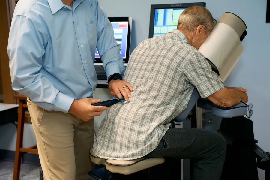 Dr. James Yager treating a patient with the gentle computer-guided ProAdjuster