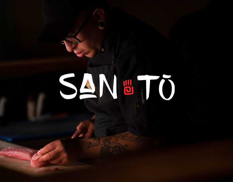 Santō hand roll bar logo over a chef preparing sushi