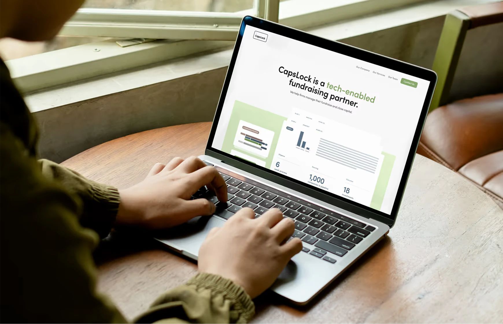 CapsLock website shown on a device