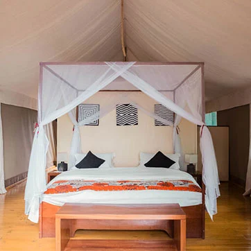 A double guest tent at Ruzizi Tented Lodge