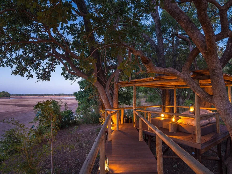 Riverside sleep-out deck at Chamilandu Bushcamp