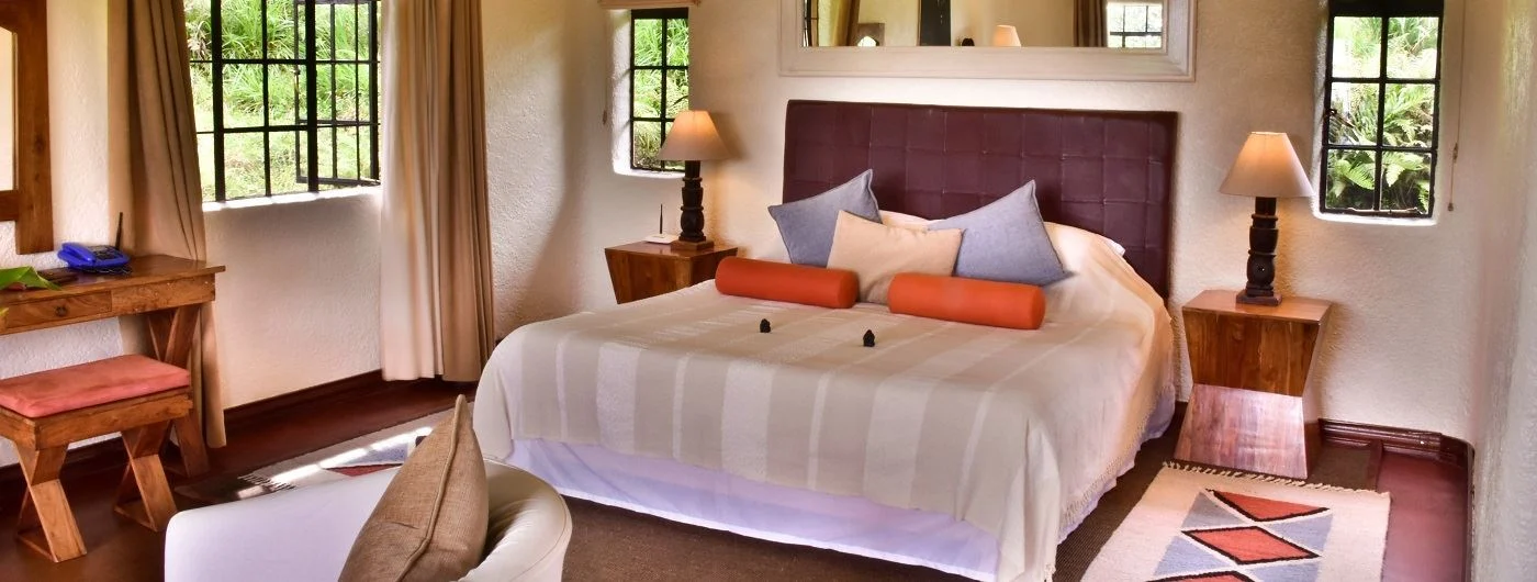 A cottage bedroom at Wilderness Sabyinyo