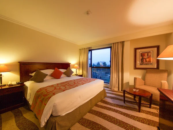 A guest room at Kigali Serena Hotel