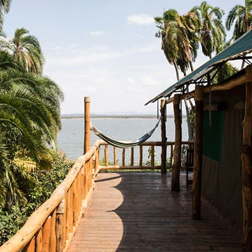 A private tent deck overlooking Lake Ihema at Ruzizi Tented Lodge