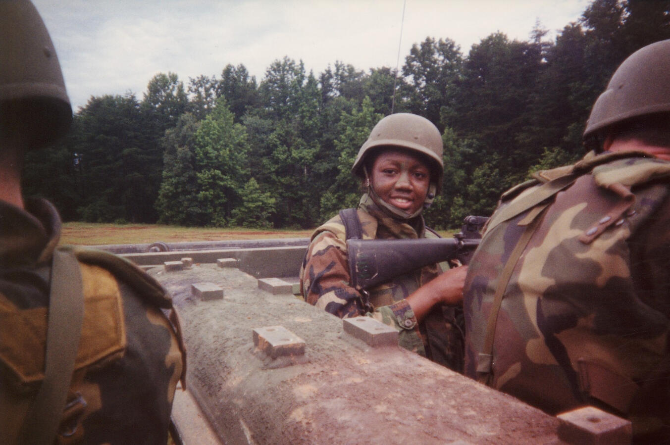 Dr. Williams in helmet and camo during a field training exercise