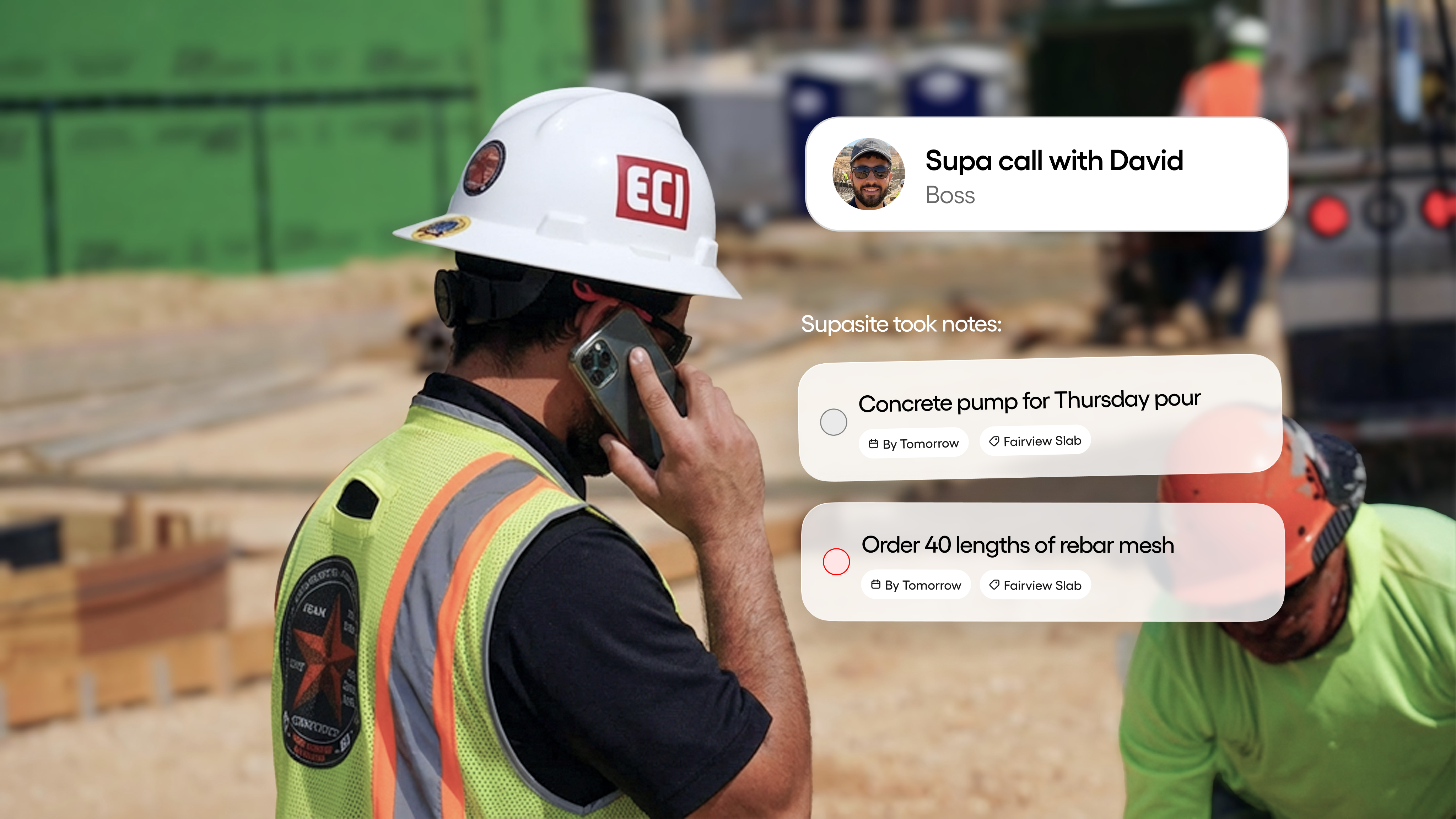 ECI worker taking a phone call on an active jobsite
