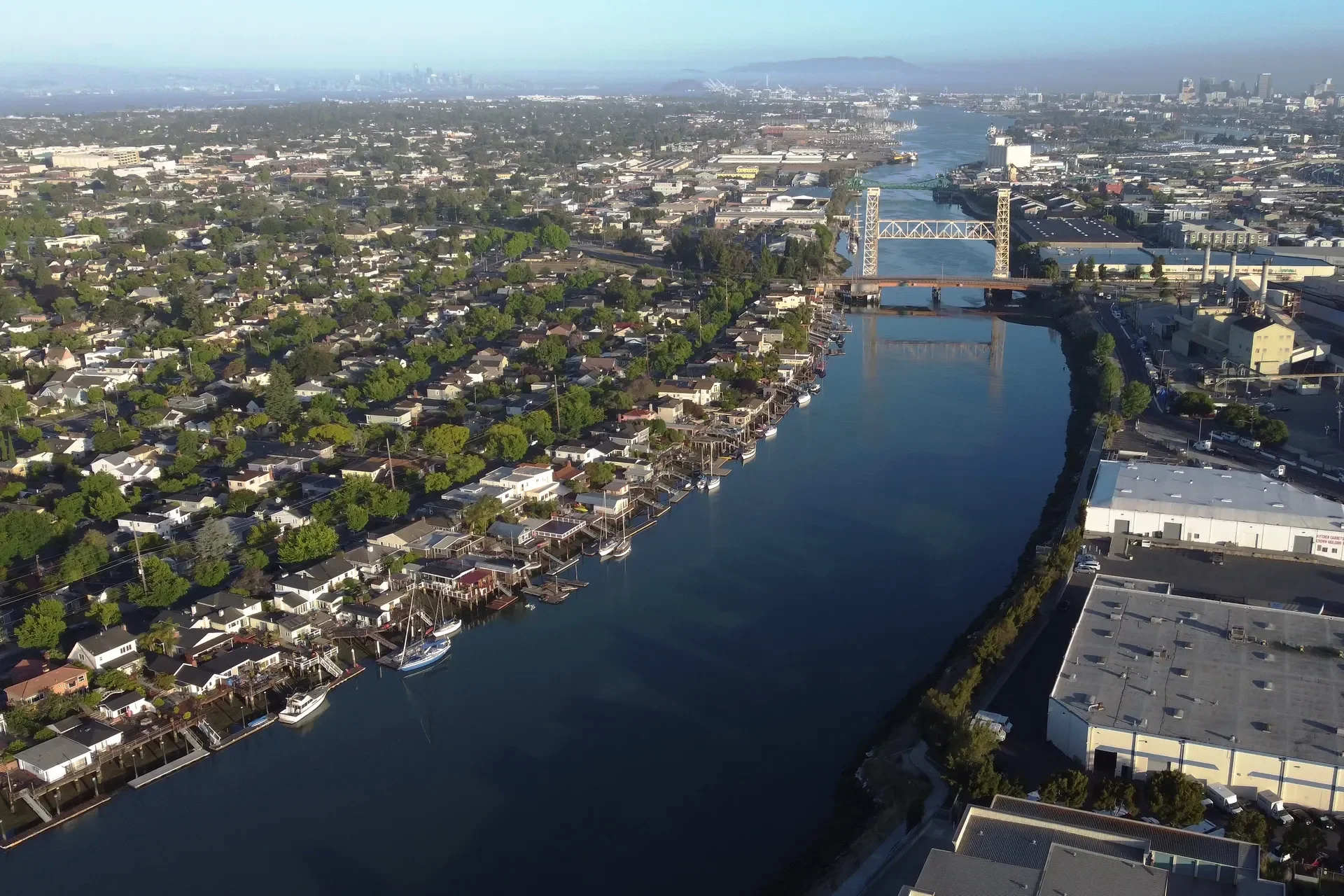 Aerial view of the Oakland Alameda Estuary with Alameda homes along the water