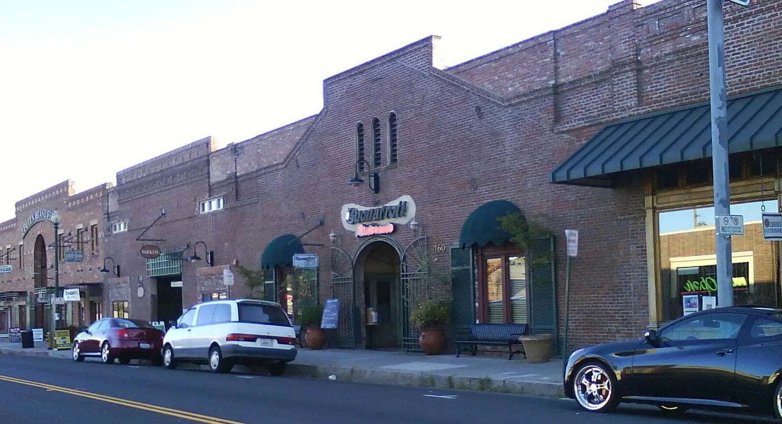 Brick storefronts in downtown Lincoln, California, a short drive from Twelve Bridges