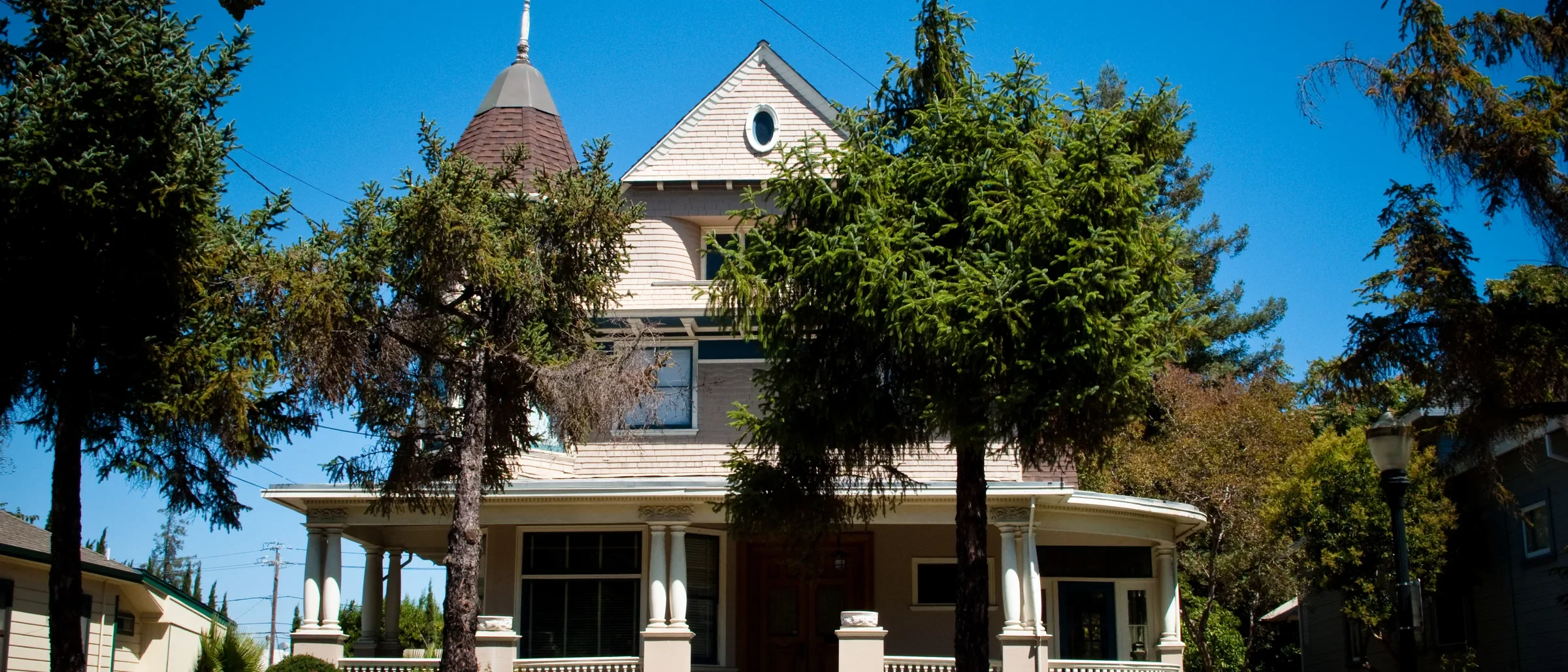 A Queen Anne Victorian with a turret and wraparound porch in the Hensley Historic District of downtown San Jose