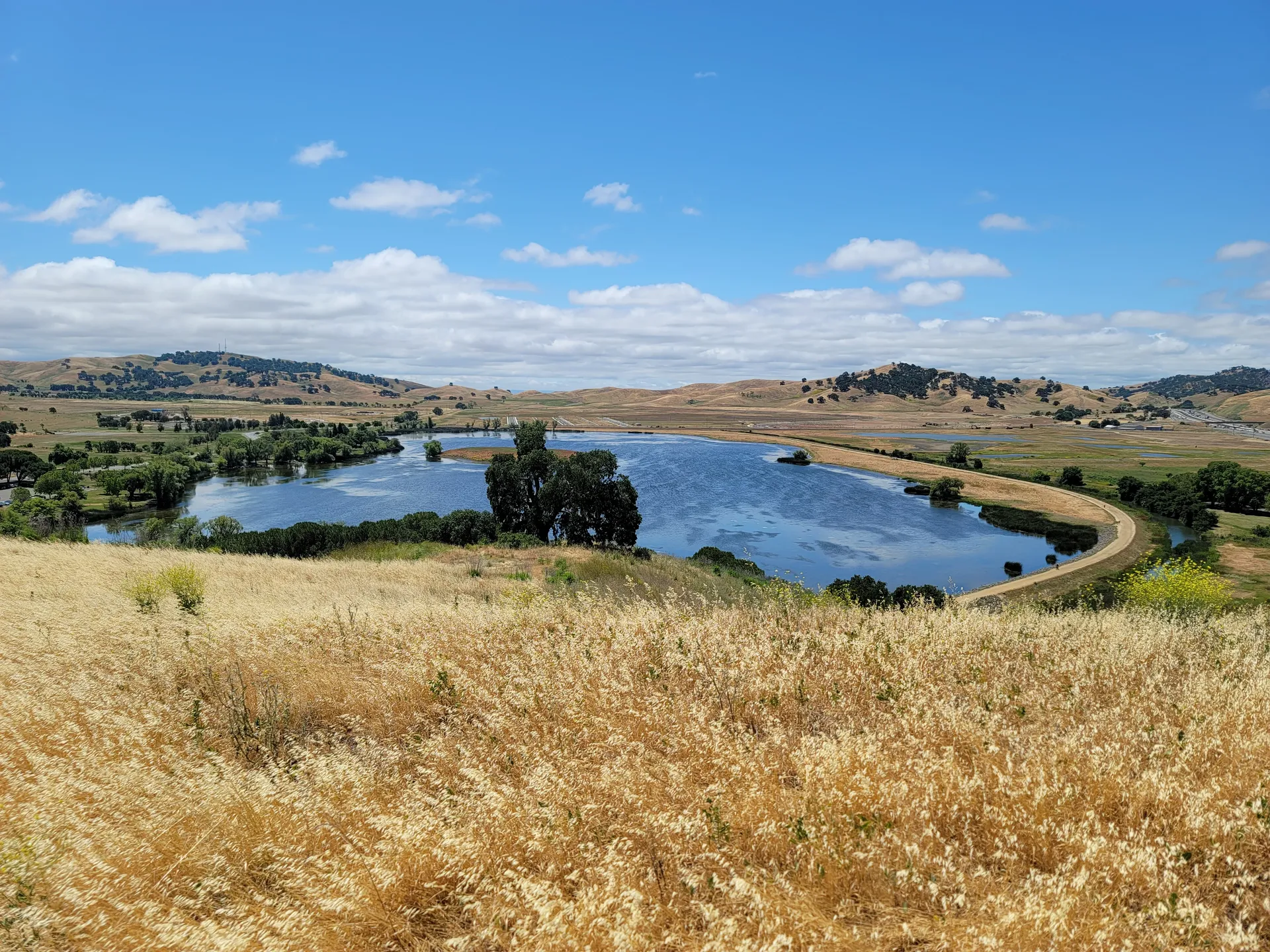 Lagoon Valley lake and golden hills in Vacaville, California, near Roberts Ranch