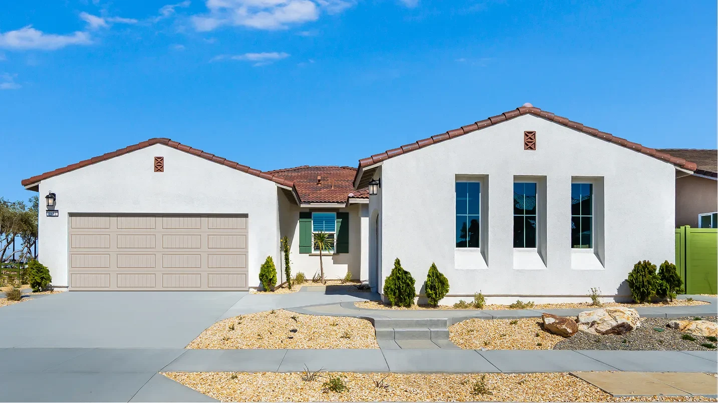 New single-story Lennar home with a tiled roof and desert landscaping at Silverwood in Hesperia, California