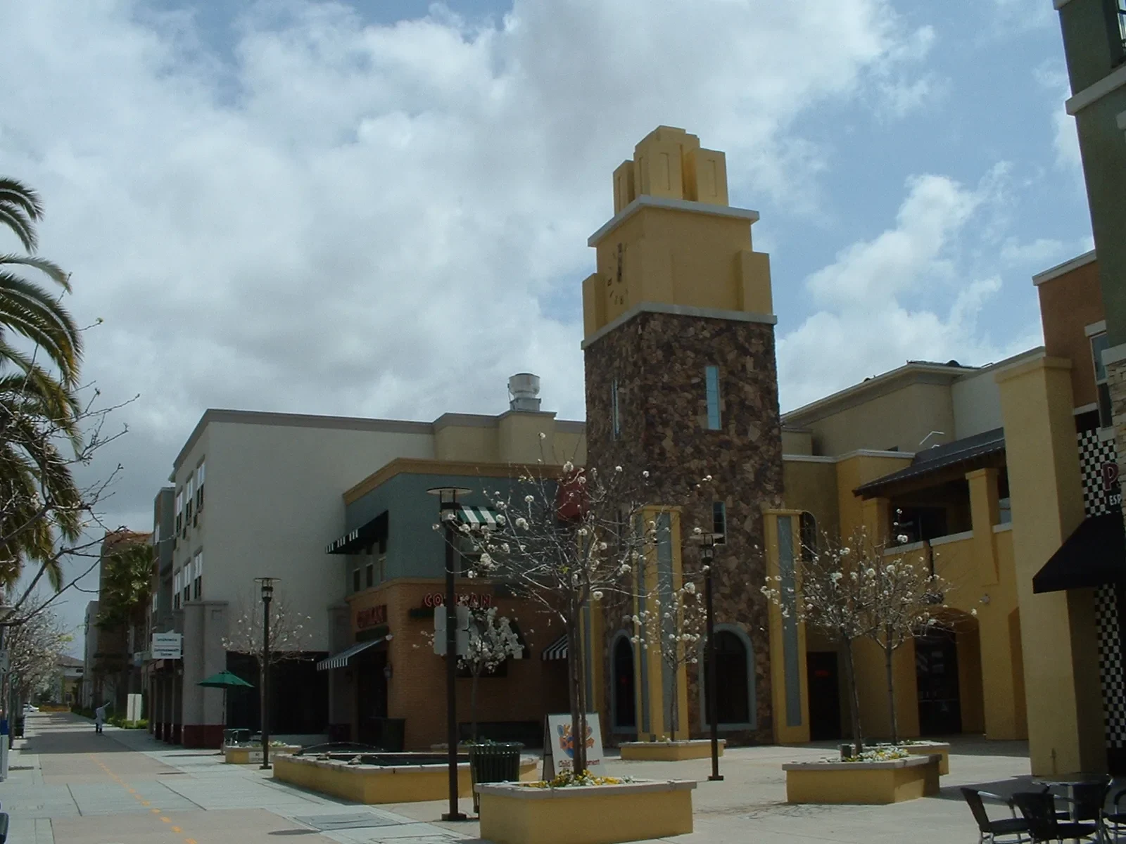 Shopping plaza with a stone tower in Otay Ranch Village 1, Chula Vista