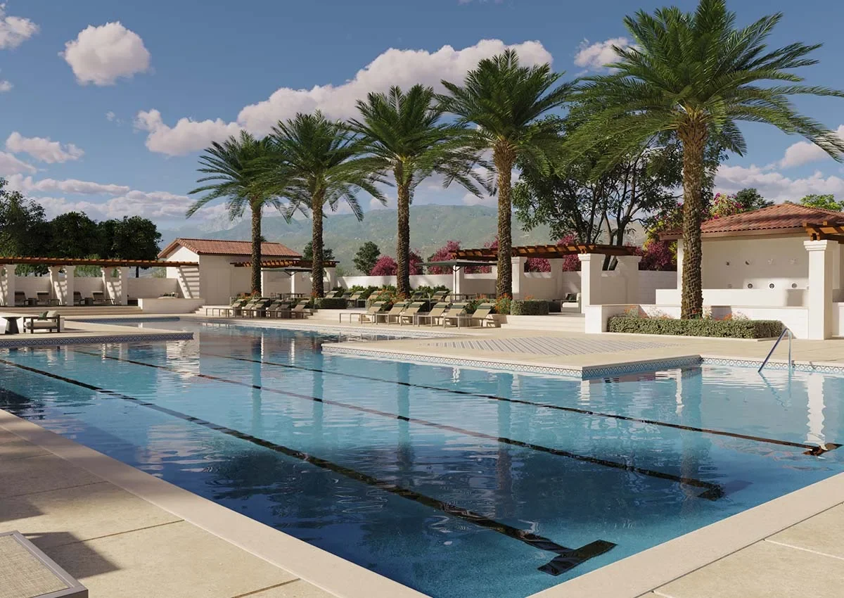 Lap pool lined with palm trees at the Gardens Clubhouse in The Arboretum, Fontana, California