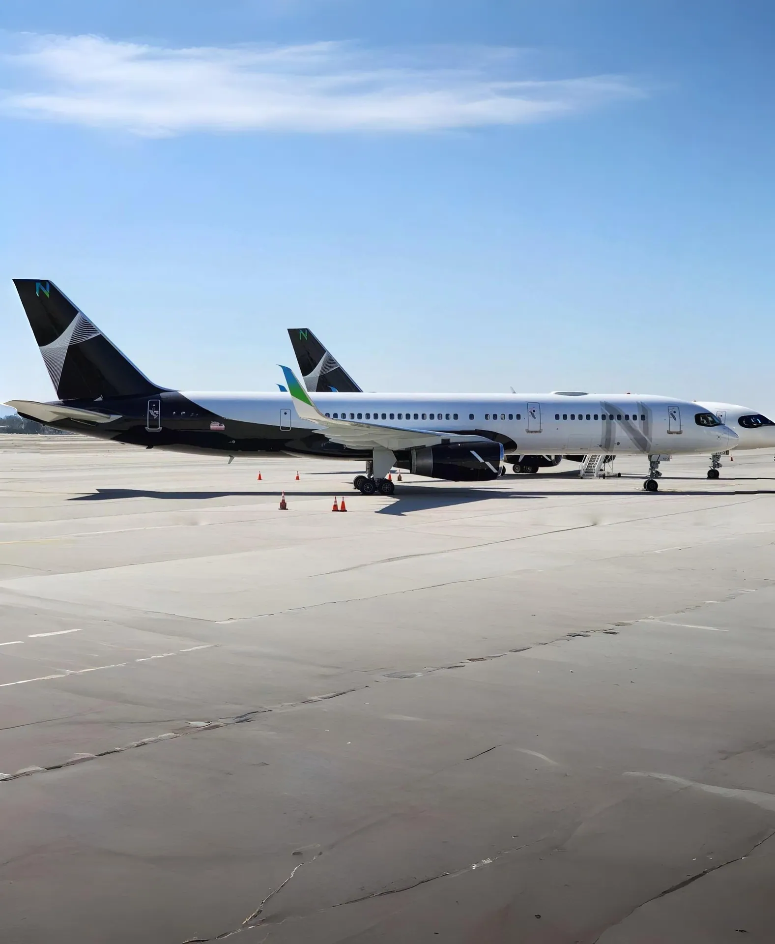 Large charter aircraft on the ramp, ready for a full touring party