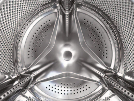 Inside an industrial washing machine drum