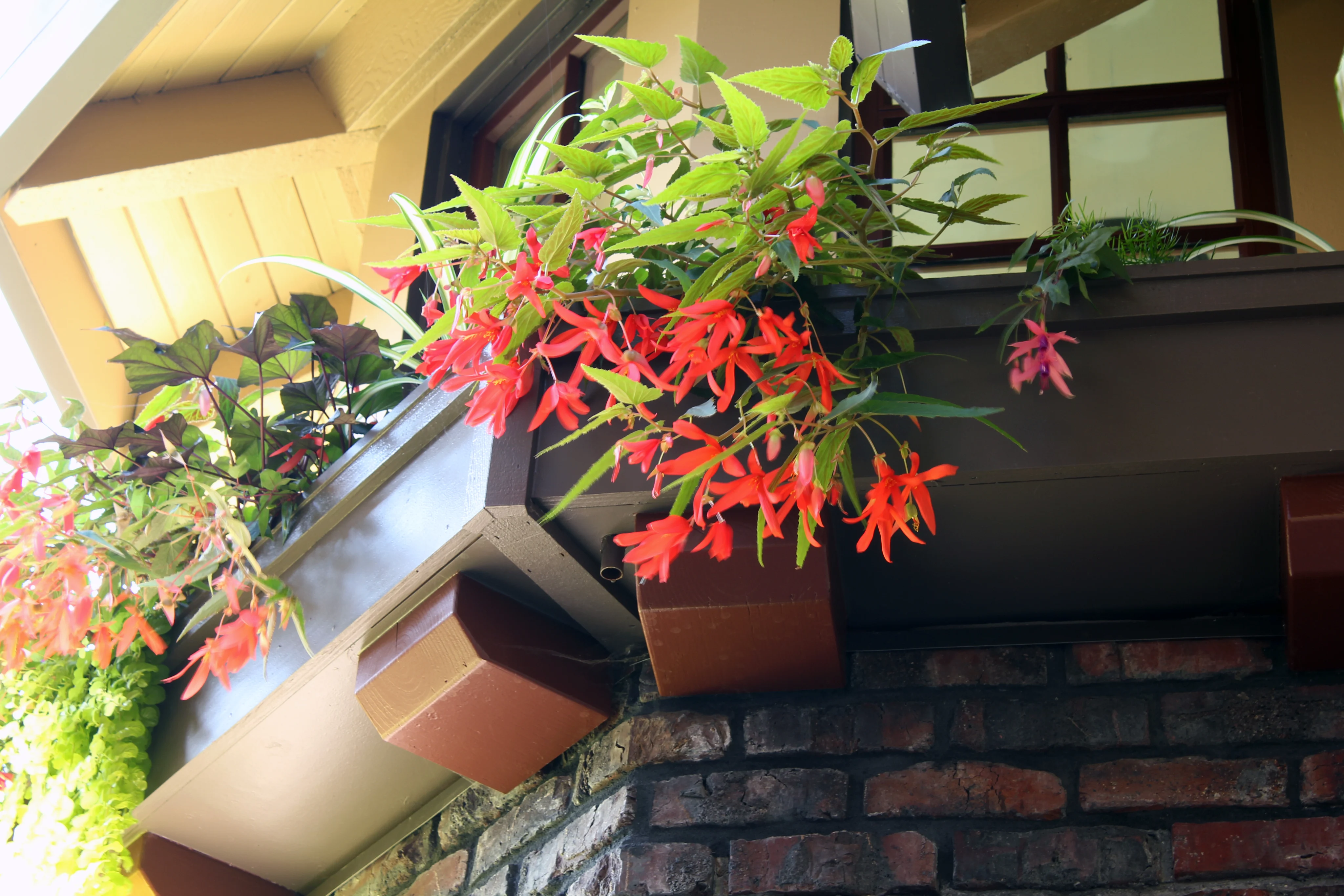 Irvington Turret, a turret window with flower boxes on a Northeast Portland home