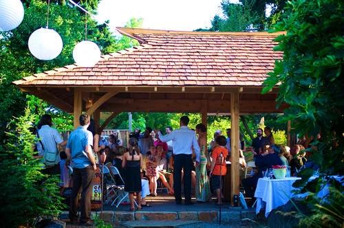 Azumaya, a Japanese-style covered pavilion with people gathered beneath it