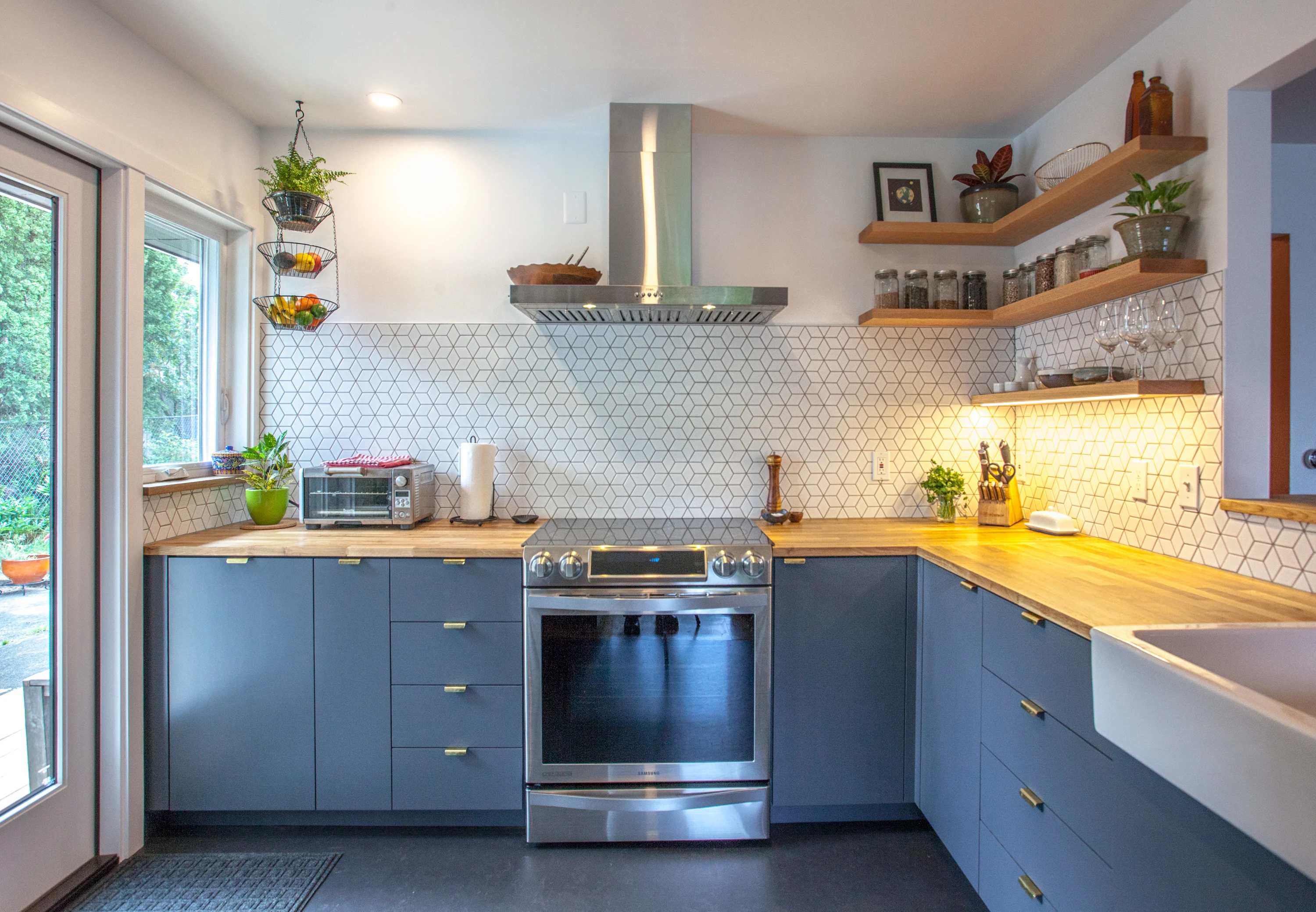 Contemporary Kitchen remodel with open shelves and a tile backsplash