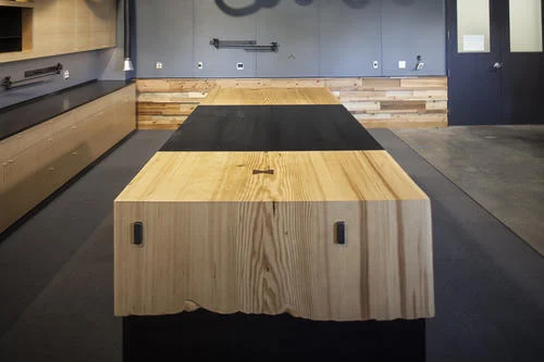 Upperlab Commercial Build interior with a large wood work table, North Portland