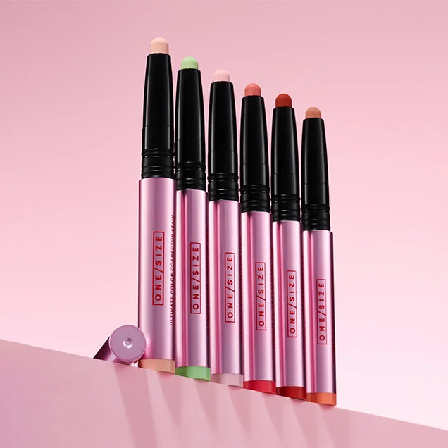 ONE/SIZE Ultimate Color Corrector sticks on pink