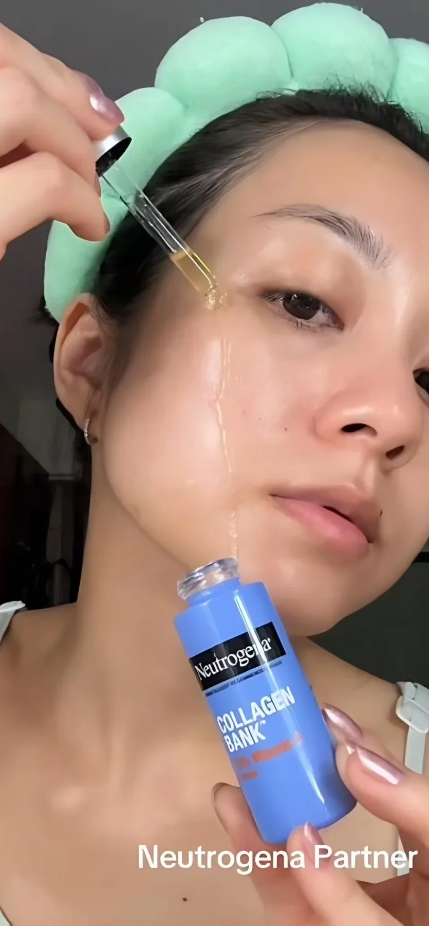 Creator applying a Neutrogena serum
