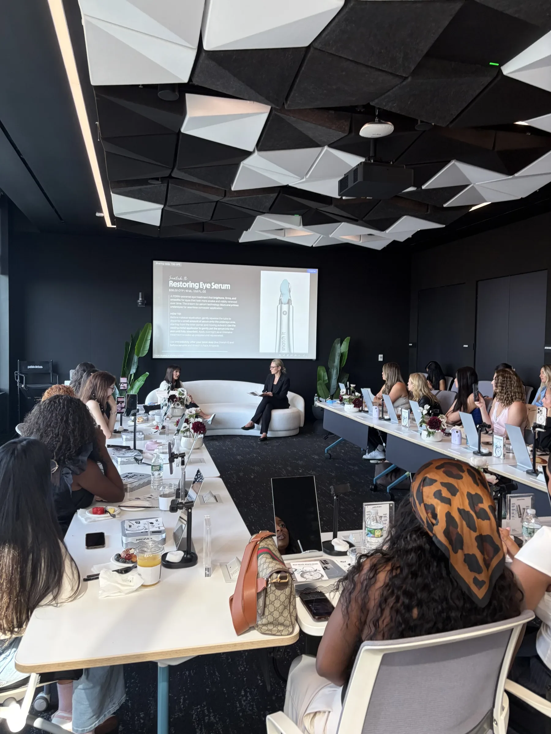 Creators filming at a POV Beauty masterclass