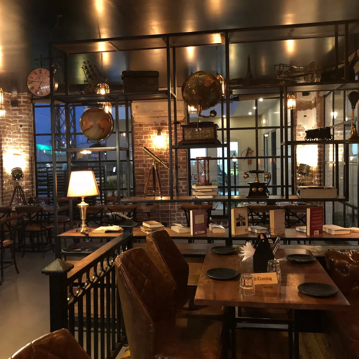 Vintage-inspired Loft Cafe interior with brick walls and warm lighting