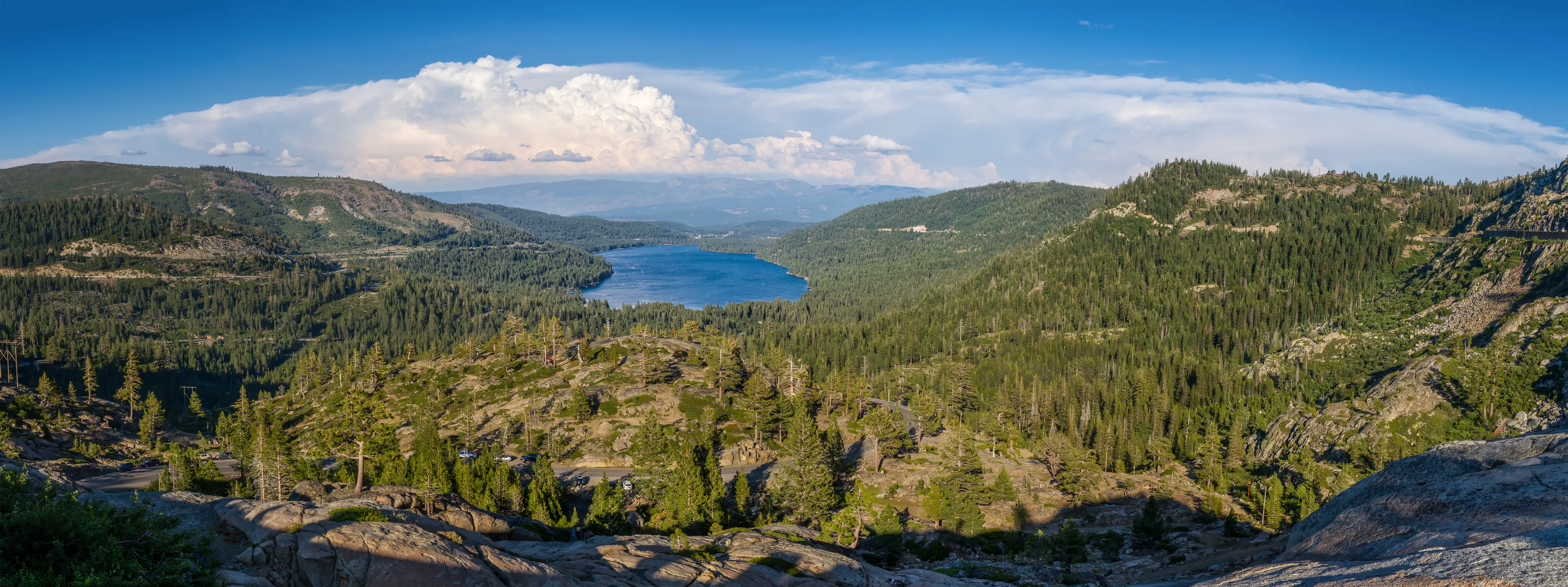 Donner Lake and forested Sierra Nevada ridges seen from Donner Pass