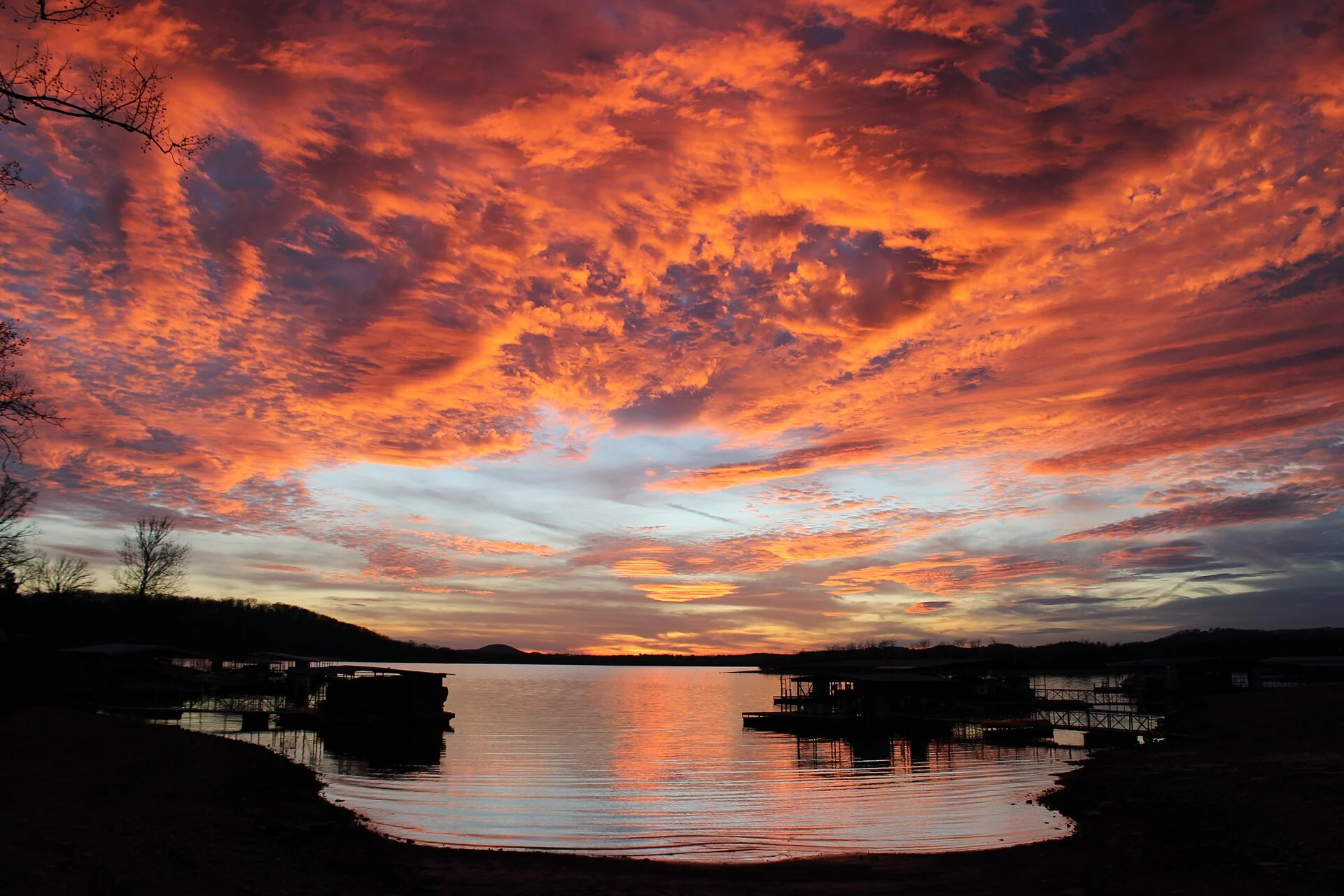 Fiery sunset reflected across Table Rock Lake