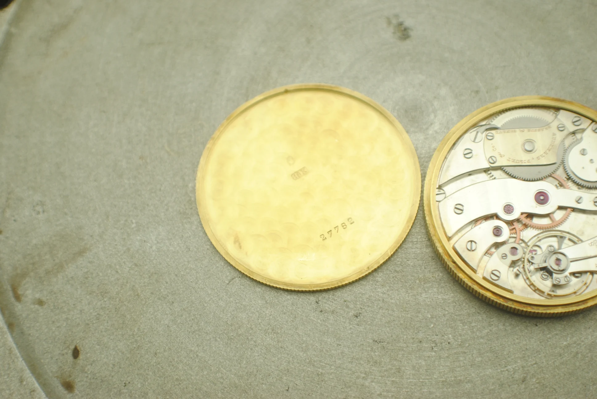 Closer view of the Audemars Piguet Jacquet inner caseback alongside part of the signed movement