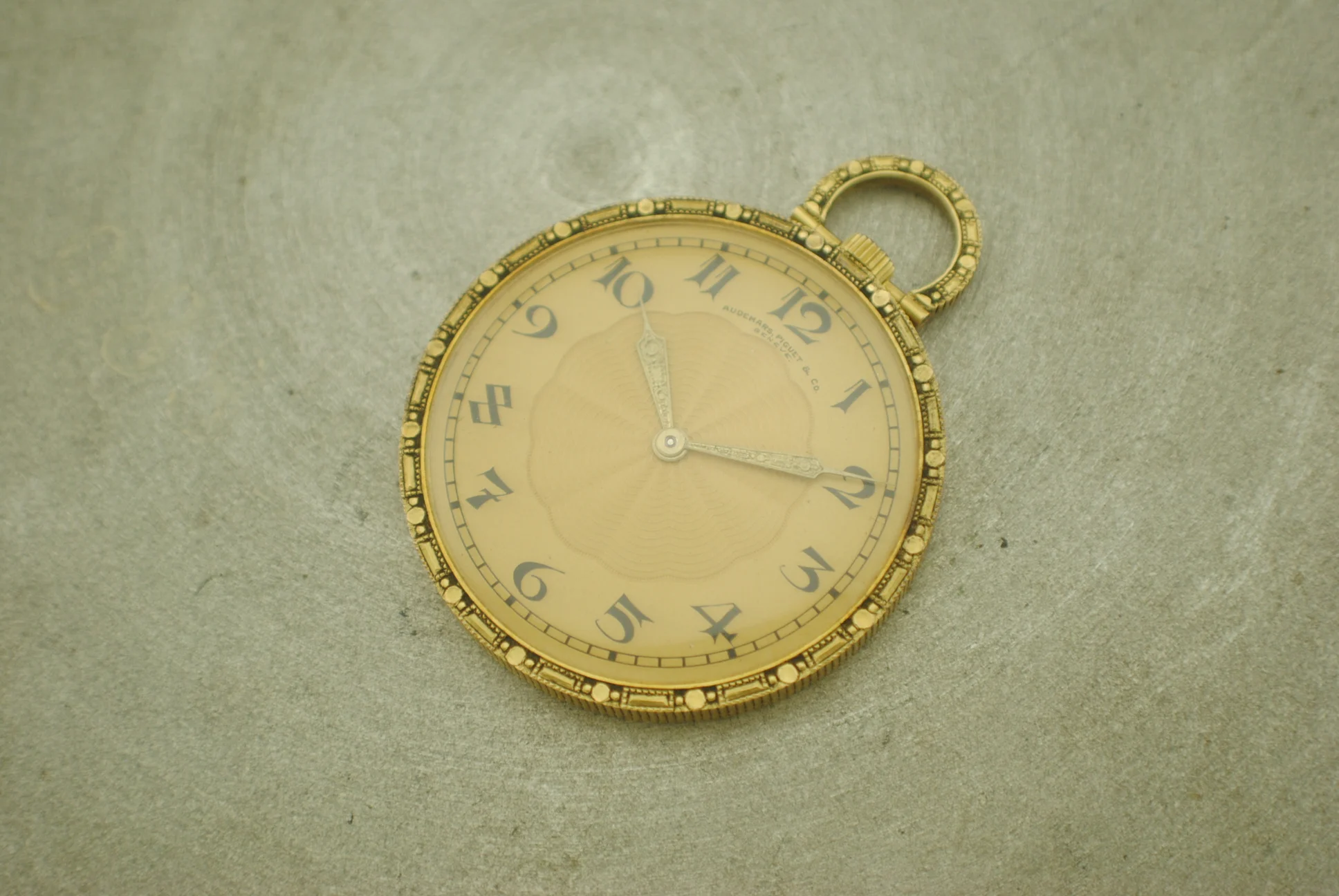 Alternate front view of the Audemars Piguet Jacquet pocket watch showing its Art Nouveau details and decorated suspension bow
