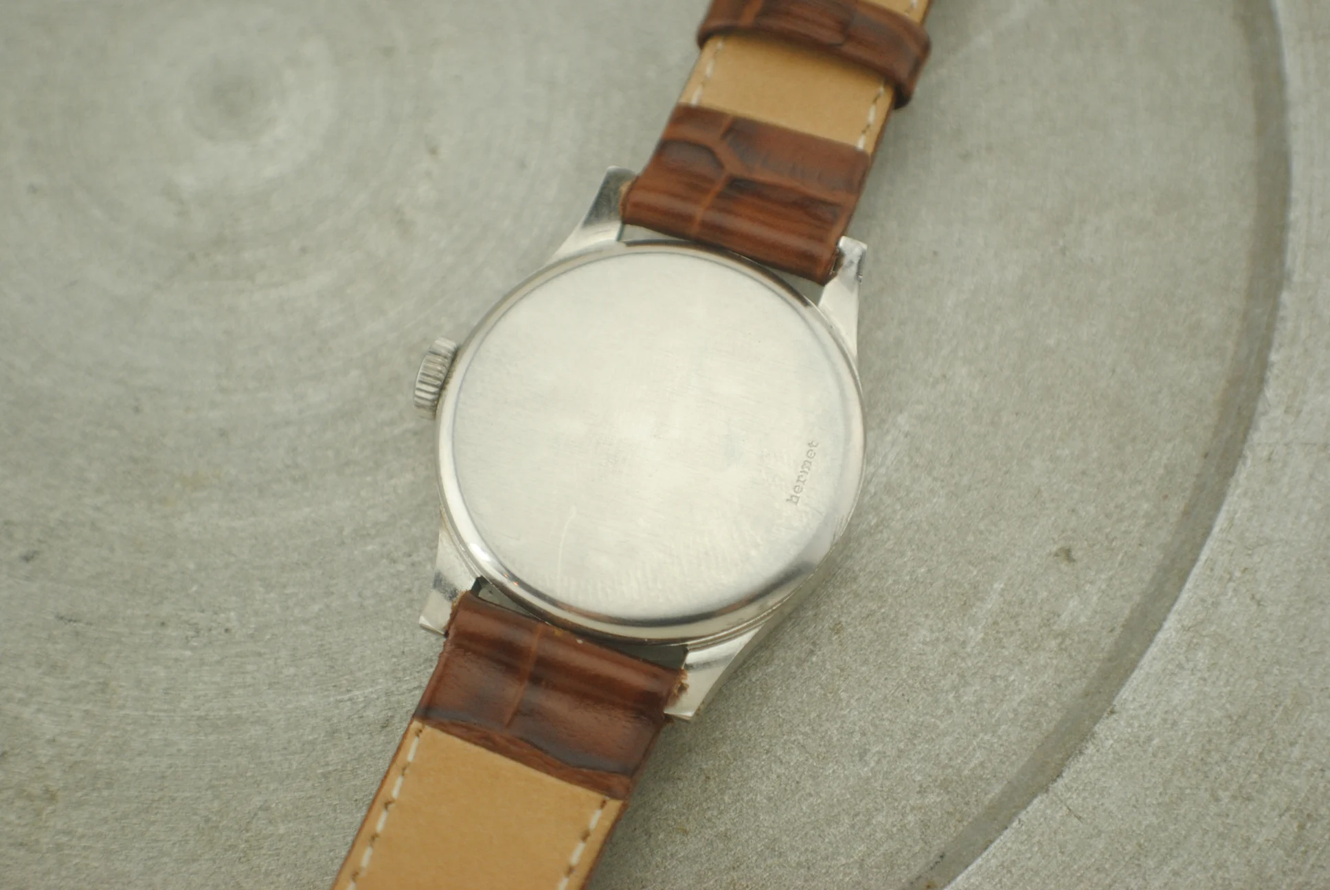 Closer view of the closed IWC Calatrava Hermet caseback and its Hermet engraving