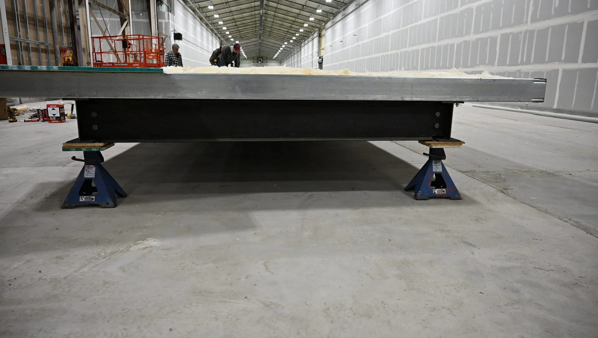 End of the integrated steel chassis supported on factory stands